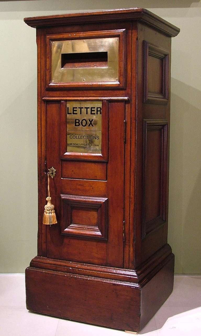 A Hotel Post Box 
Constructed in mahogany, with a brass letter box. Post boxes of this size were installed in hotels and gentlemen’s clubs shortly after the inauguration of Rowland Hill’s postal service in 1840 