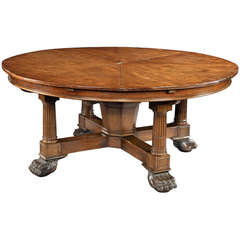 Très rare table de salle à manger circulaire extensible à action mécanique 'Jupe' d'antiquité