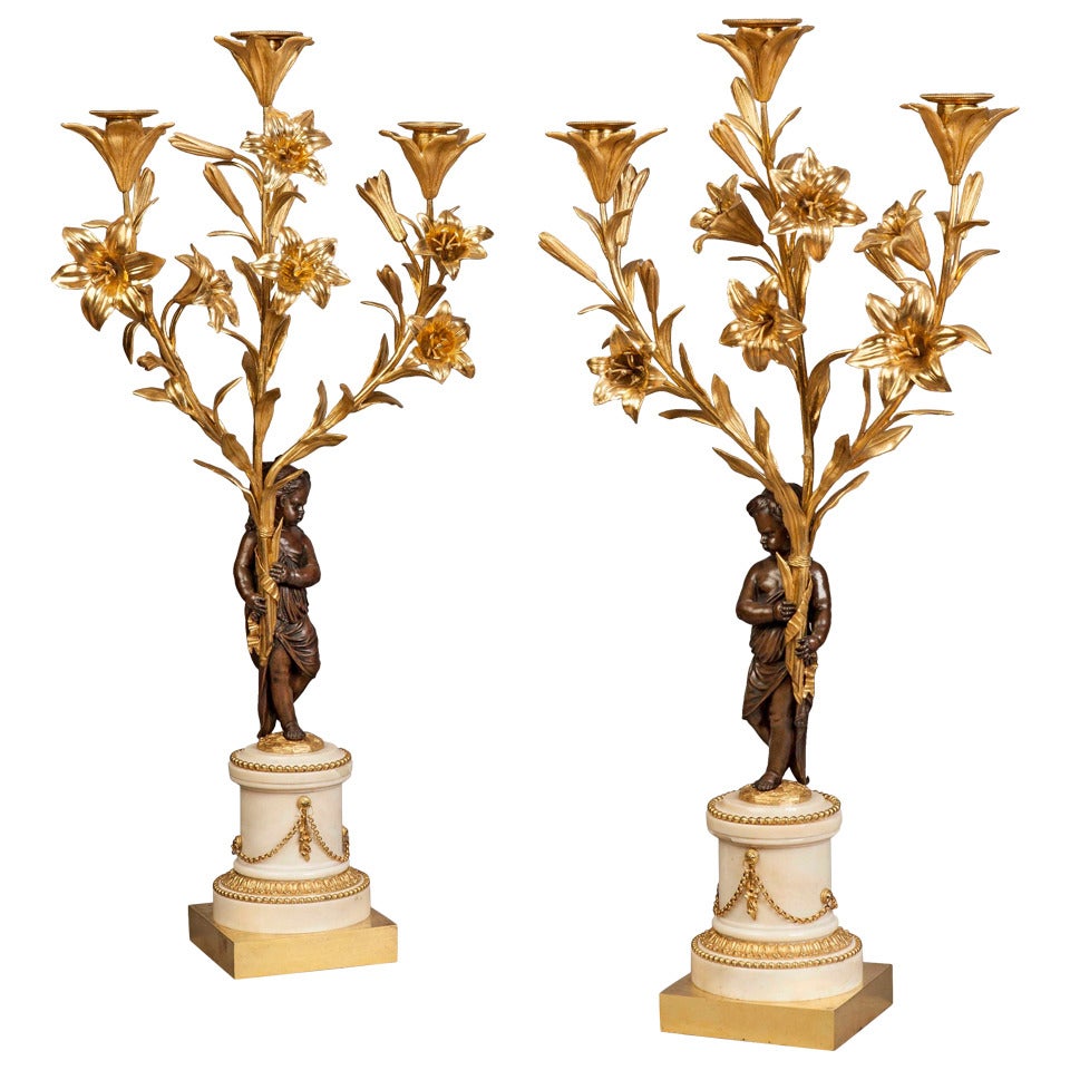 Pair of French Antique Bronze and Ormolu Candelabra