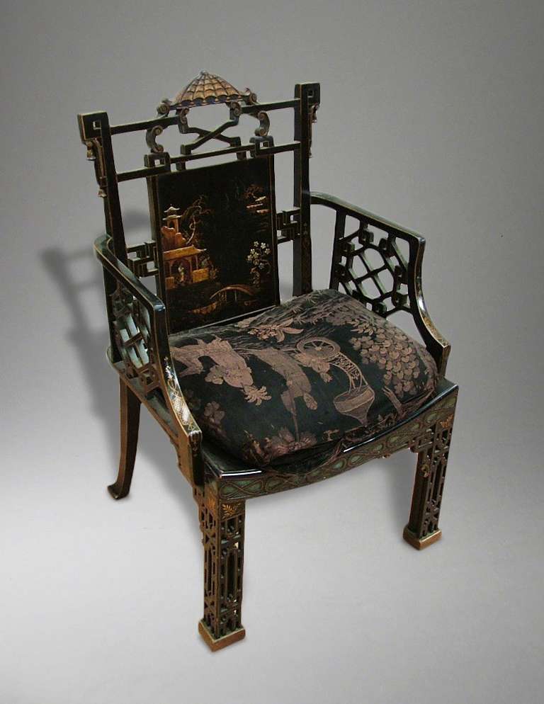 An armchair in the ‘Chinese Chippendale’ manner.  

The design for the frame of this chair is drawn from Plate XXVII in Thomas Chippendale’s ‘The Gentleman and Cabinet Maker’s Directory; having square block footed front legs with extensive