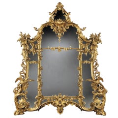 An Antique Giltwood Mirror of Substantial size in the Rococo Chippendale Manner