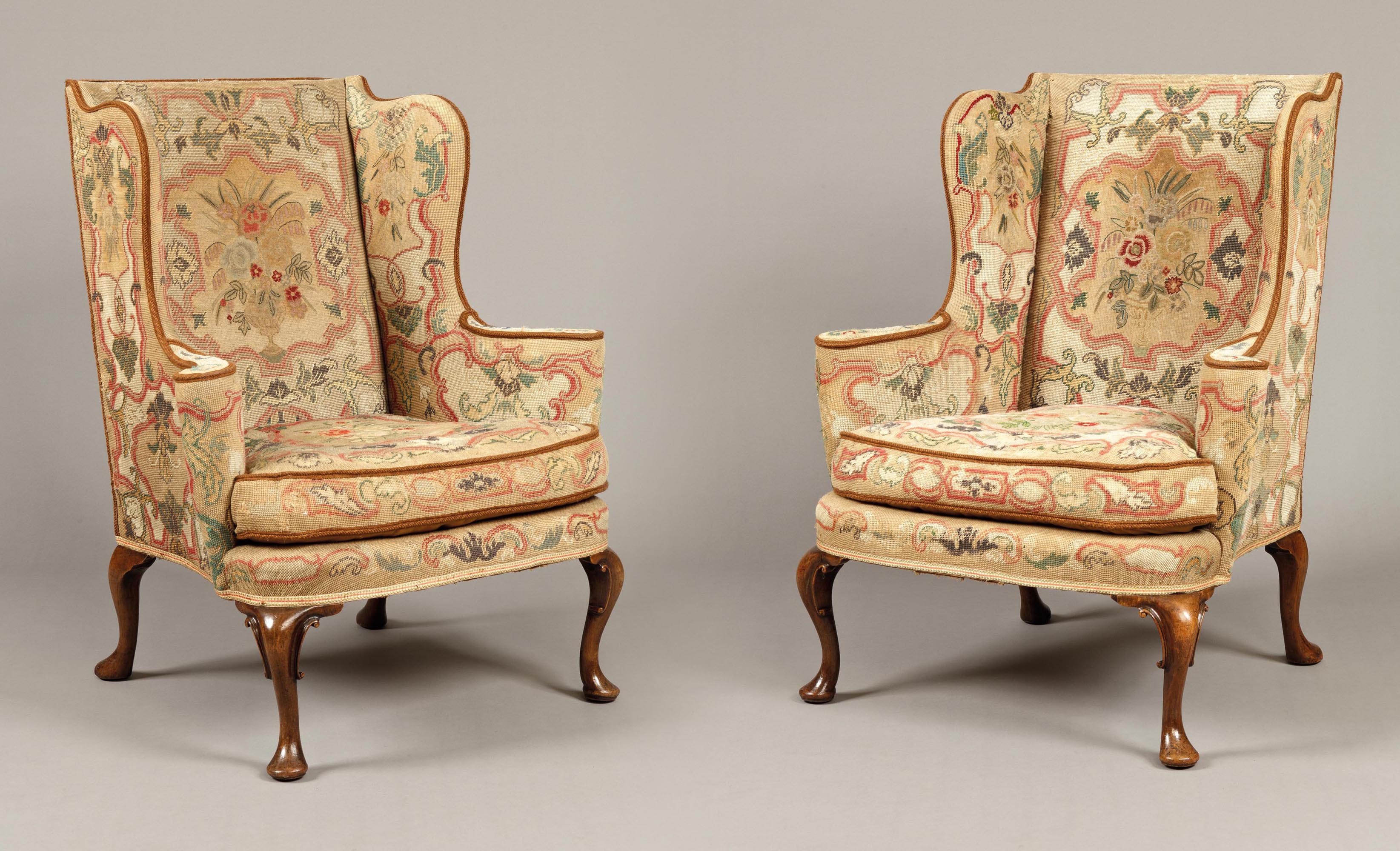A Pair of Antique Wing Backed Armchairs In the mid-Georgian Manner 