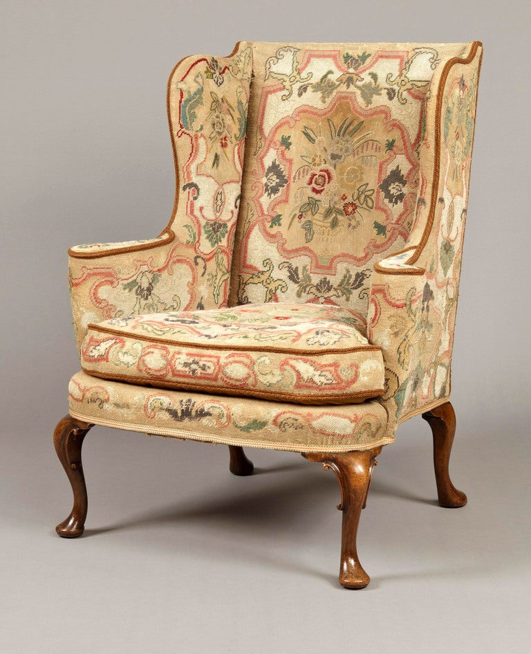 British A Pair of Antique Wing Backed Armchairs In the mid-Georgian Manner 