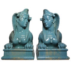 Turquoise ceramic sphinxes