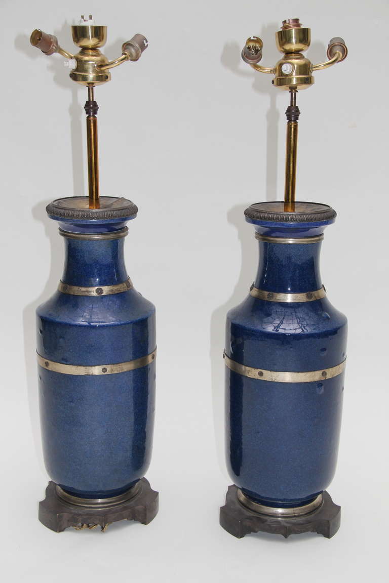 Bleu du Roi Sevres porcelain pair of table lamps with bronze stand and mounts, marked in the base.
