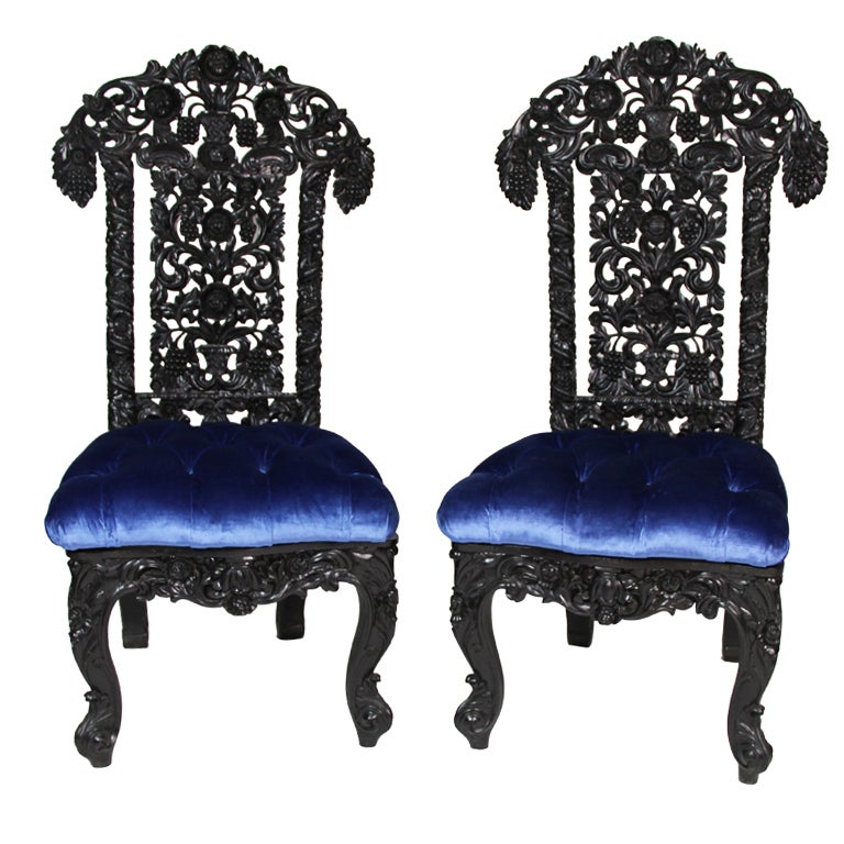 A Pair of Carved Ebony Wood Chairs For Sale