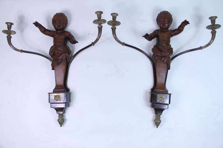 Carved walnut estÃ­pite child shape with bronze, gilt, and silver mounts wall sconces by Pierre Lottier from the collection of Villalonga familly in Barcelona