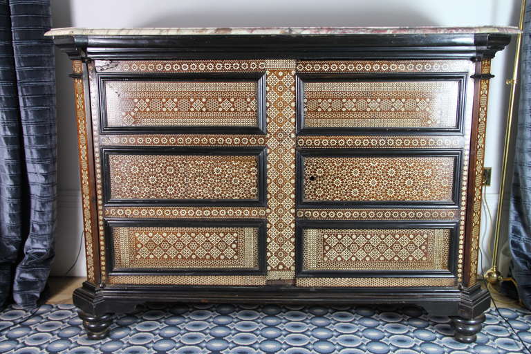 Massive walnut, ebonized Wood and cow bone inlaid marquetry called 