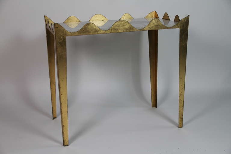 A gilt brass and white marble top side table by