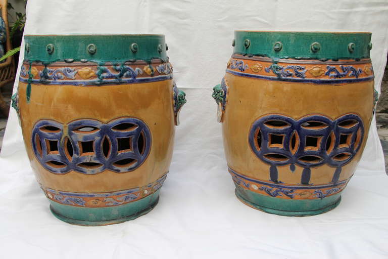 A set of four glazed ceramic garden stools