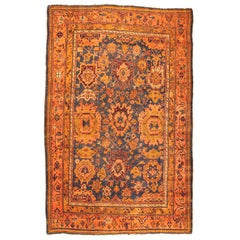 Ancien tapis d'Oushak avec de grandes palmettes