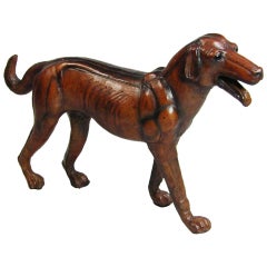Leather model of a dog in naturalistic pose 