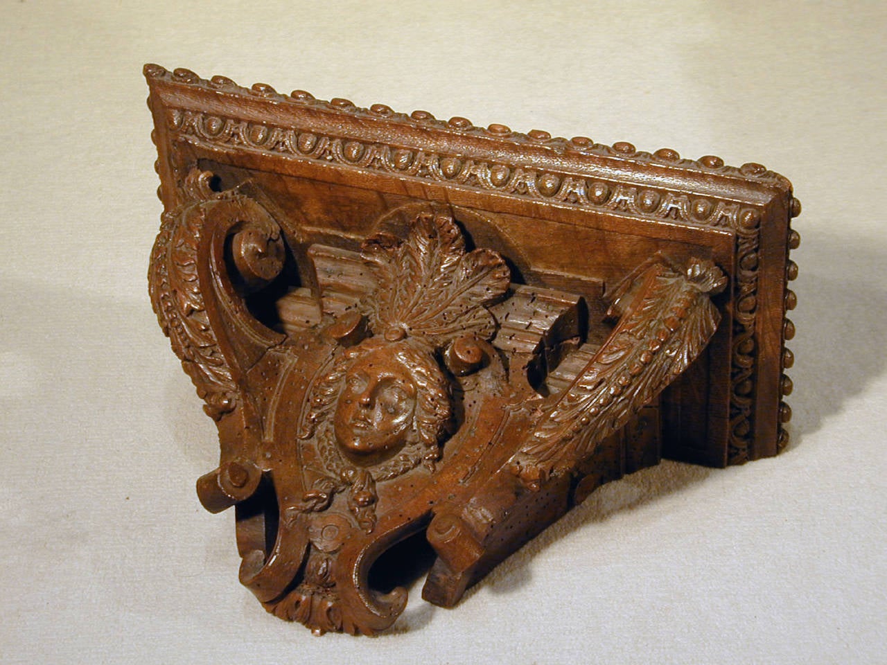 French Regence period carved walnut bracket.