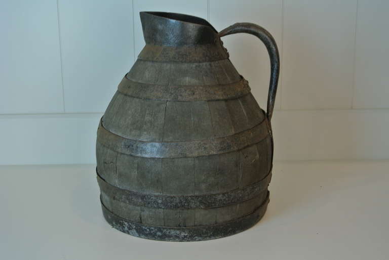 Antique Wood and Iron Pitcher