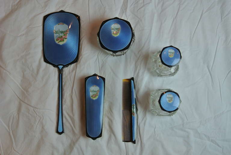 Blue enamel and gilt vanity set.