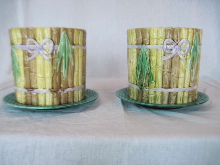 George Jones Beautiful set of majolica cachepots with matching plates. Bamboo and bow motif.