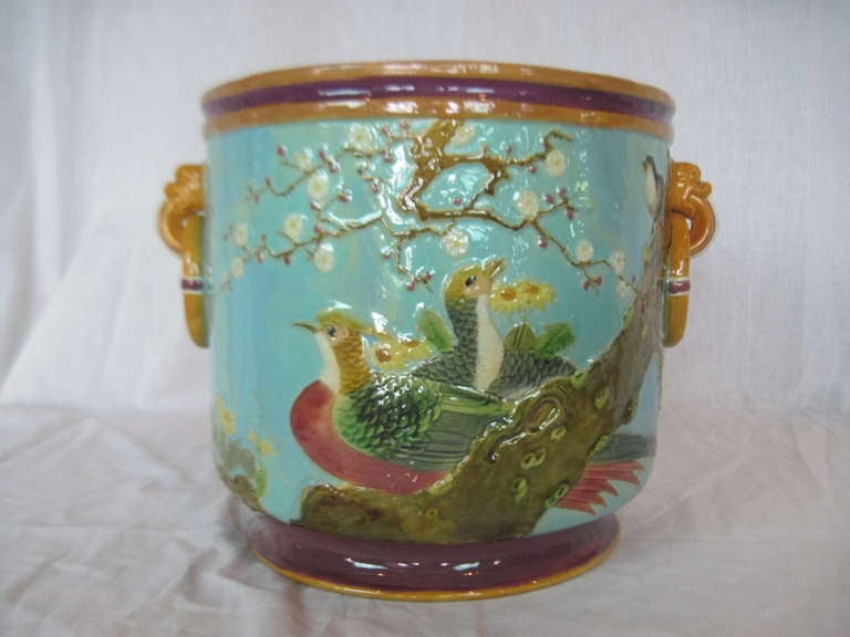 Holdcroft Antique majolica cachepot with asian motif of peonies and birds.
