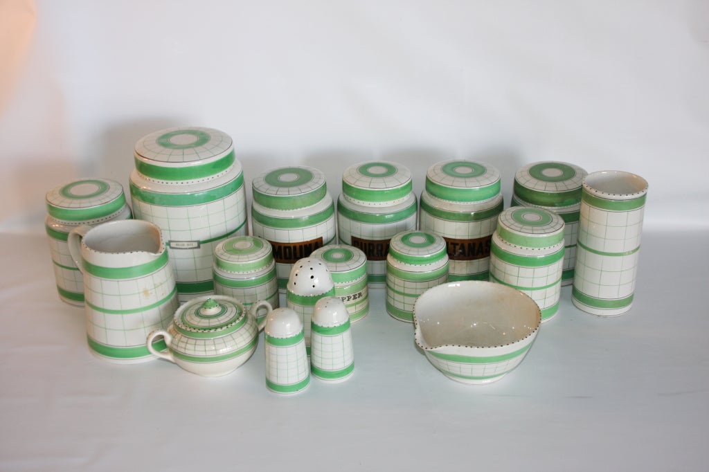 17 piece collection of English Cottage Green Decorated Kitchen Porcelain and Tablewares. Early 20th Century. Stamped 