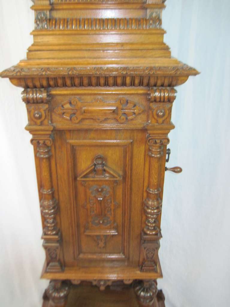 Victorian Carved Oak Clock and Disk Music Box Combination