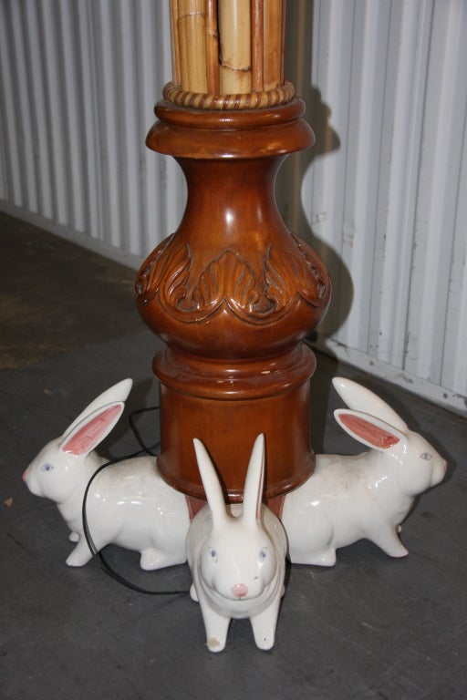 Unique wood, bamboo and ceramic footed rabbit floor lamp. Made by MacKenzie Childs in the year 2000, from the Warren Collection.  Beautiful MacKenzie Childs beaded shade included.