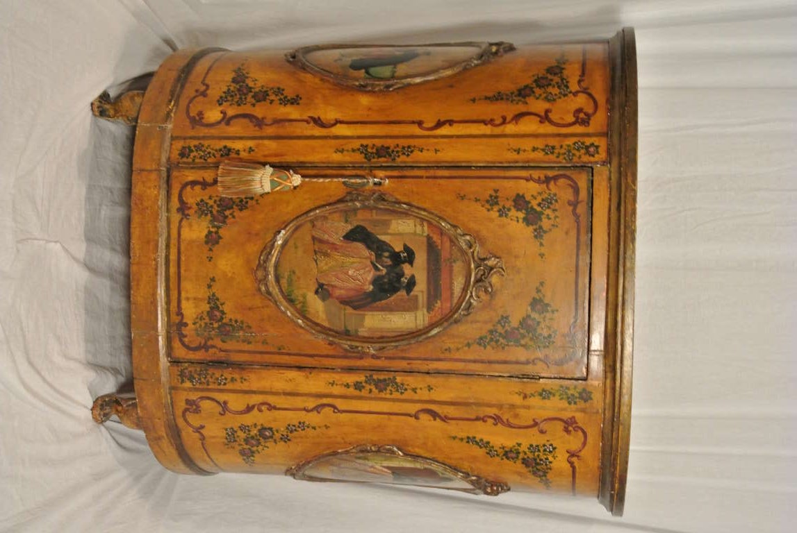 Great very old half moon painted Venetian console. There is one large door that affords much storage. Romantic scenery painted oval panels surrounded by gold acanthus trim. Solid plank back shows age.