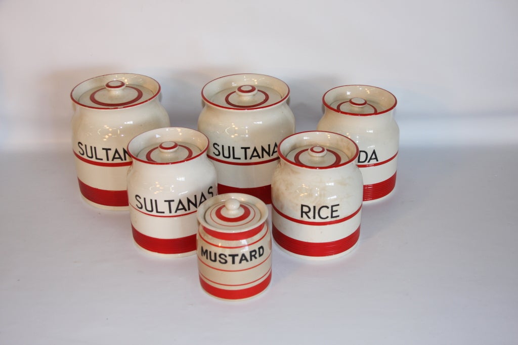 Red and White decorated Kleen Kitchen Ware by Sadler, stamped. Comprising 6 canisters (5