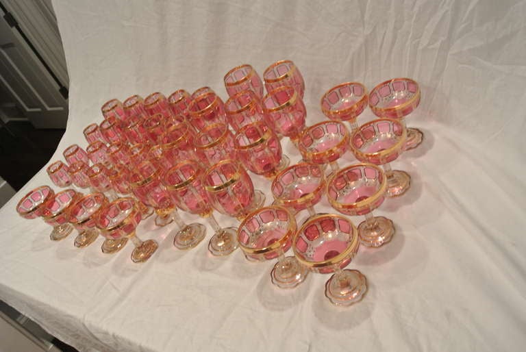 Bohemian Cranberry and Gilt Overlay Stemware Service For Sale 4