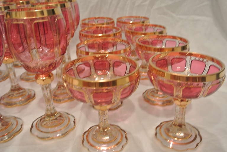 Bohemian Cranberry and Gilt Overlay Stemware Service For Sale 1