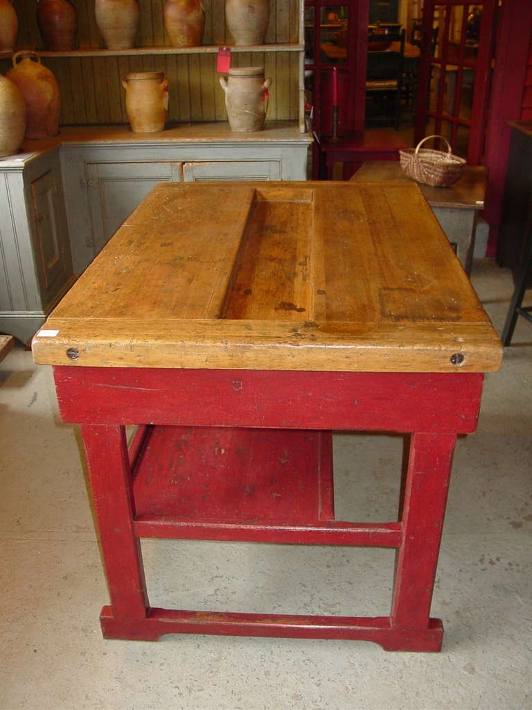 Late 19th century Industrial work bench.  There are two drawers.
Reset lower shelf allows room for stools. Ideal for a kitchen island.
Restored