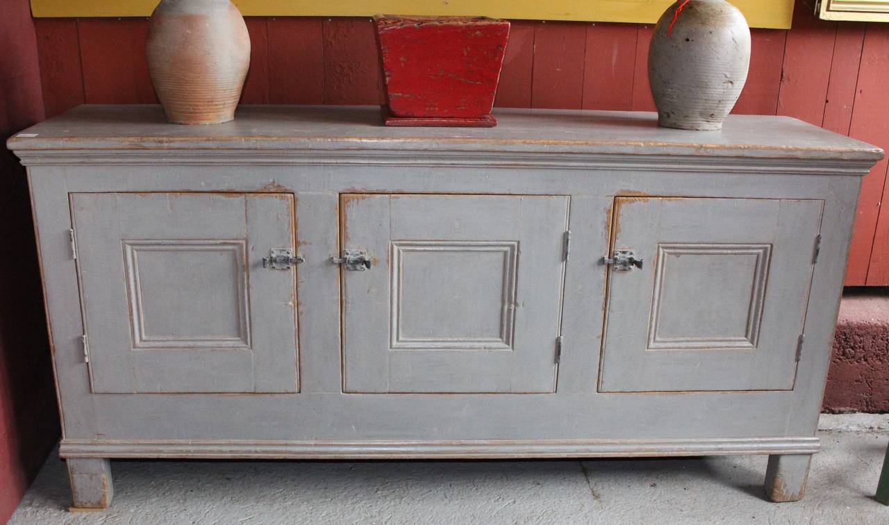 A simple three-door sideboard cupboard from Quebec.