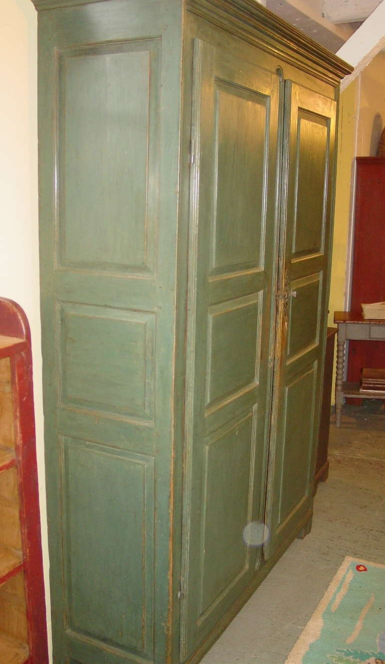 green armoire cabinet