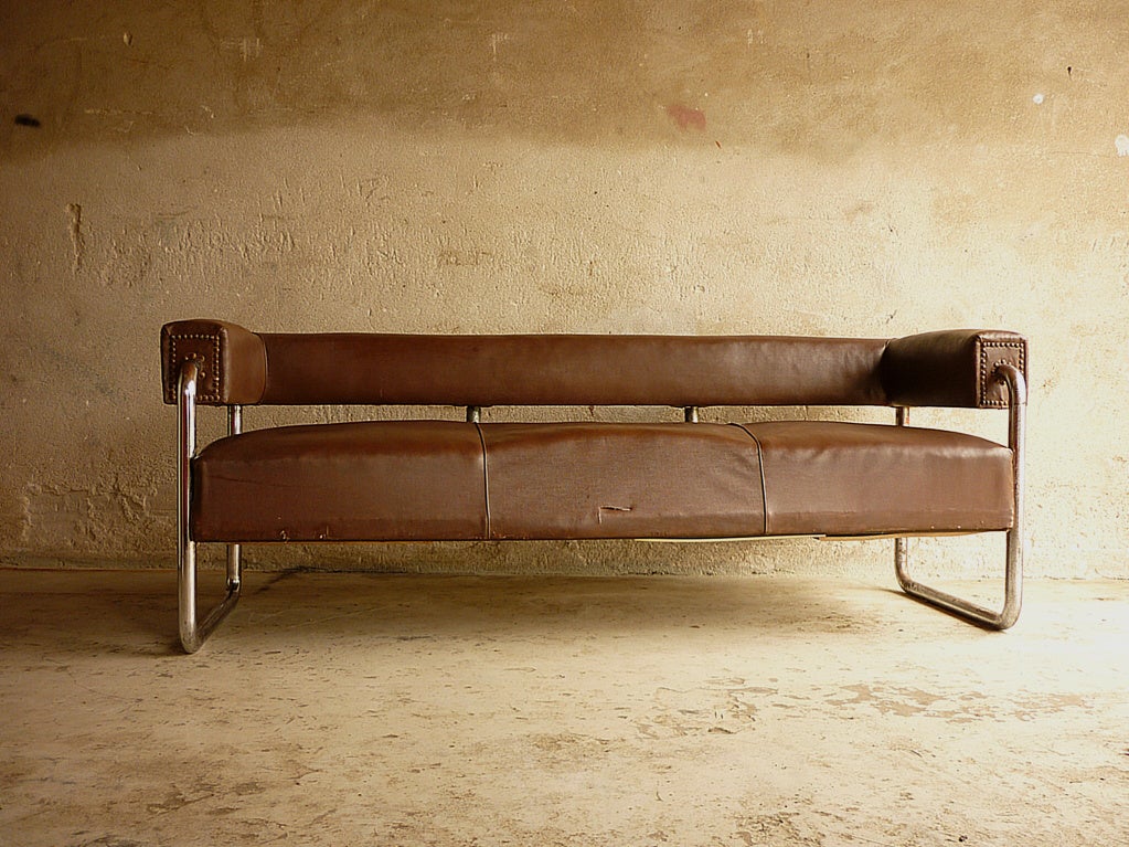Heavy Bauhaus sofa from the Faculty of Prague. We bought it from its 1st owner a former academic who lived in Munich. When he started teaching at the faculty he took this sofa with him. The sofa is marked with a paper sticker: 