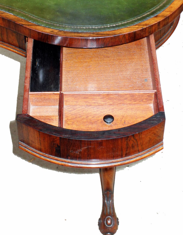 A Simply Stunning Quality William IV Period Kidney 
Shaped Writing Table Having Leather Top Above 
Three Mahogany Lined Drawers To Frieze Supported By Unusual Half Tablet And Half Double Column End Supports Terminating With Carved Cabriole Legs