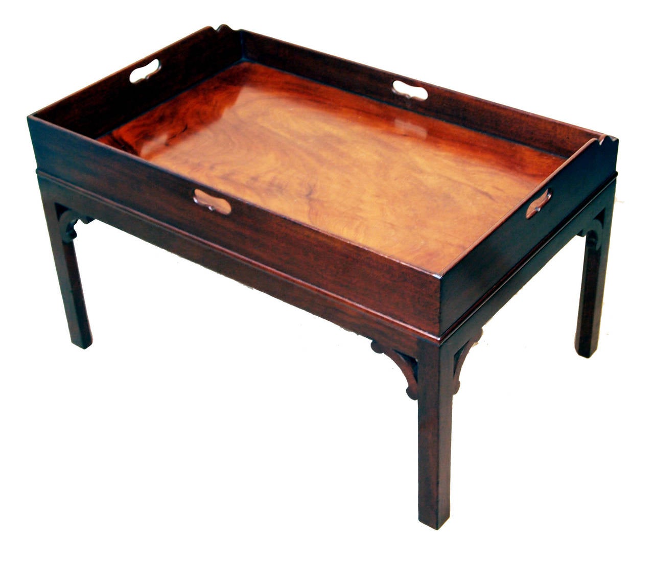 A Very Good Quality Georgian Mahogany Butlers Tray Having 
Superbly Figured Top And Pierced Handles Fixed To Later 
Square Leg Mahogany Stand