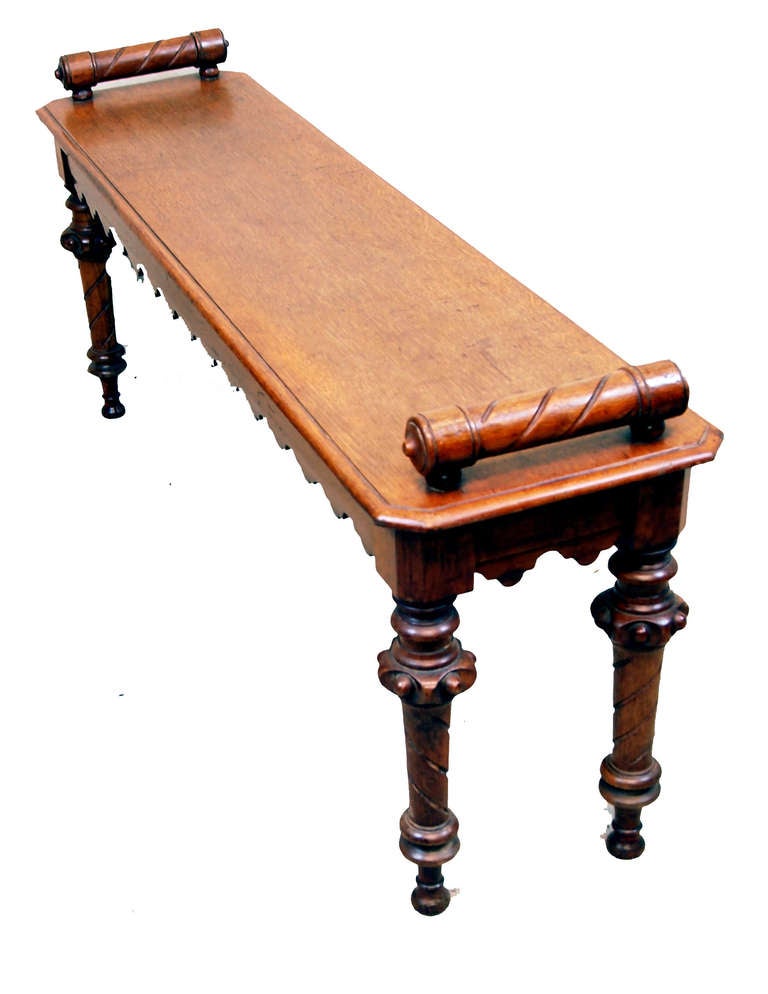 A Mid 19th Century Oak Window Seat Hall Bench Having Applied 
Turned Rolls To Rectangular Top And Shaped Frieze Raised On 
Very Unusual Turned & Carved Legs