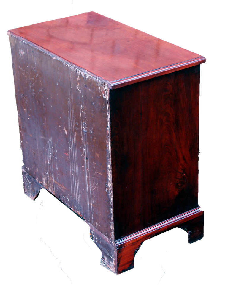 A Delightful George III Period Mahogany Chest Of Diminutive
Proportion Having Well Figured Rectangular Top Above Brushing
Slide And Four Long Drawers Standing On Original Shaped
Bracket Feet