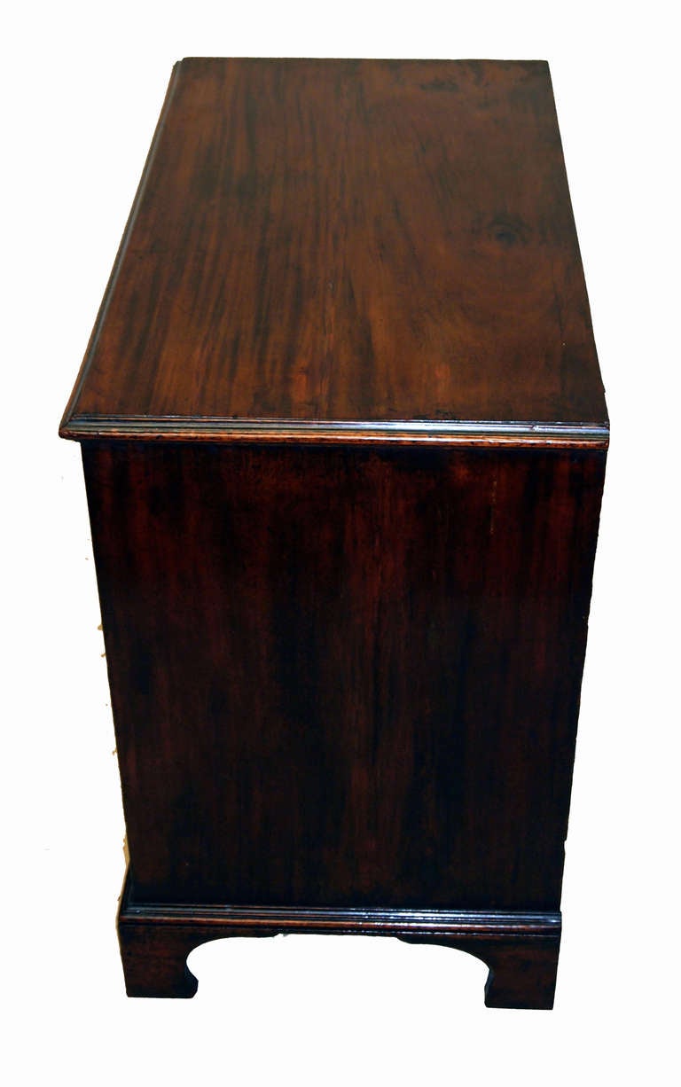 An 18th century mahogany chest of
superb color and patina unusually having
six short drawers above two long drawers
standing on original bracket feet.