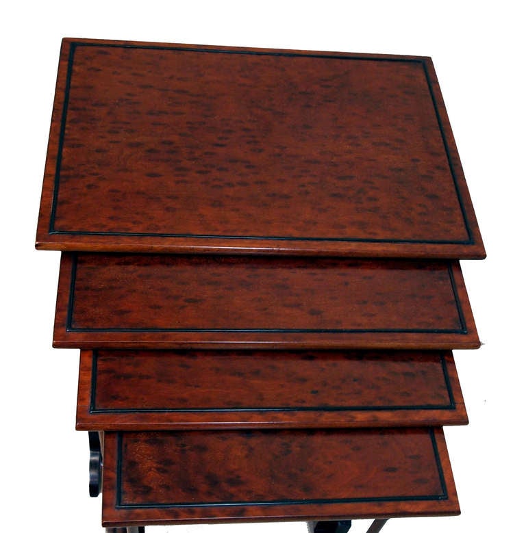 A superb quality late 19th century plum pudding mahogany
Quartetto nest of coffee tables having cock beaded panels
to tops and elegant turned supports united by bow stretchers.