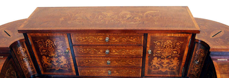 A Stunning Quality Late 19th Century Mahogany Carlton House
Desk With Profuse Marquetry Inlay Decoration Throughout,
Having Arrangement Of Drawers, Cupboards And Pigeon Holes
Above Sliding Writing Surface And Two Frieze Drawers Raised On
Elegant