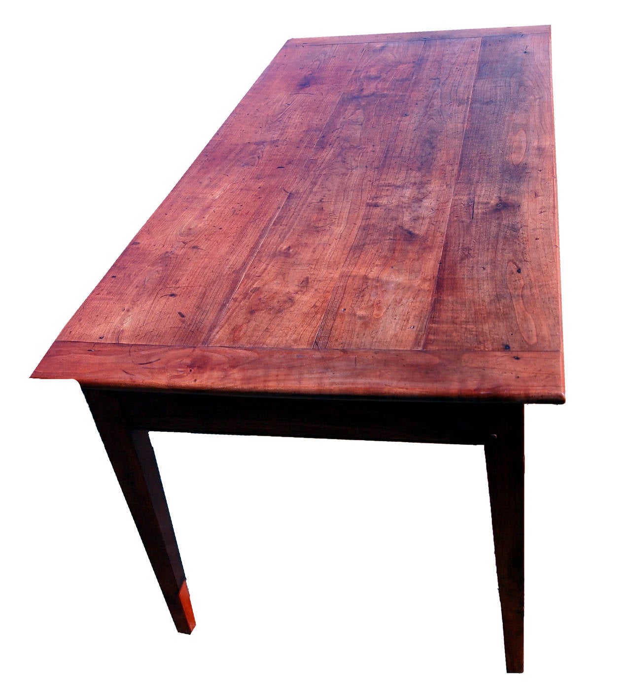 A Delightful Mid 19th Century Cherry Wood French Farmhouse 
Dining Table Having Well Figured Plank Top Which Retains 
Exceptional Colour And Patina, Above One Frieze Drawer With 
Original Turned Wooden Knob Raised On Square Tapered Legs
