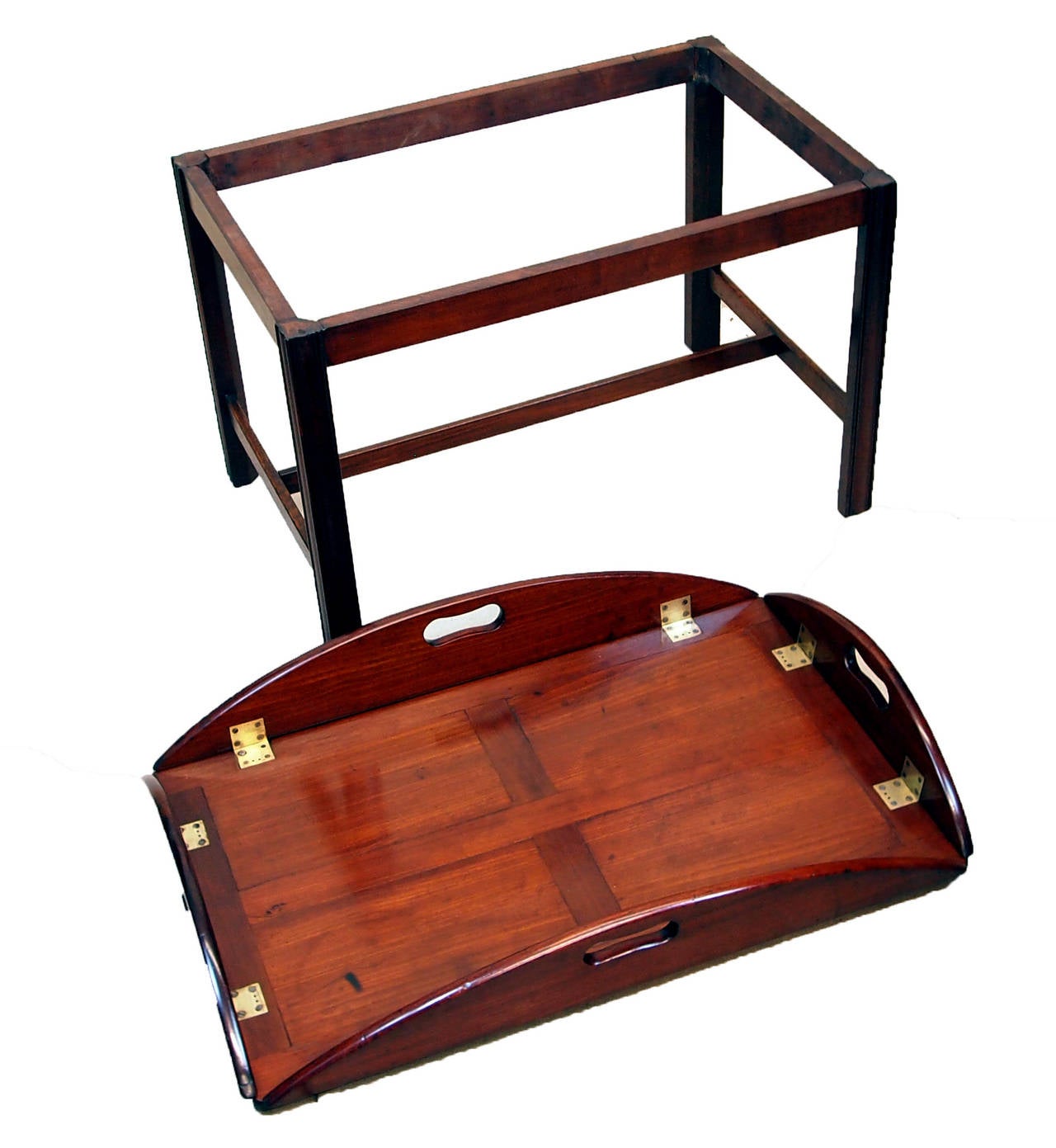 An Attractive George III Period Mahogany Oval Butlers Tray Having 
Pierced Handles To Folding Sides With Original Brass Hinges 
Housed on Later Mahogany Square Leg Stand
