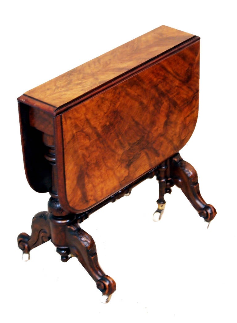 A Delightful 18th Century Mahogany Table	
Having Superbly Figured Circular Tilting Top	
Raised On Gun Barrel Stem and Tripod Base