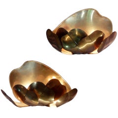 A pair of copper sconces