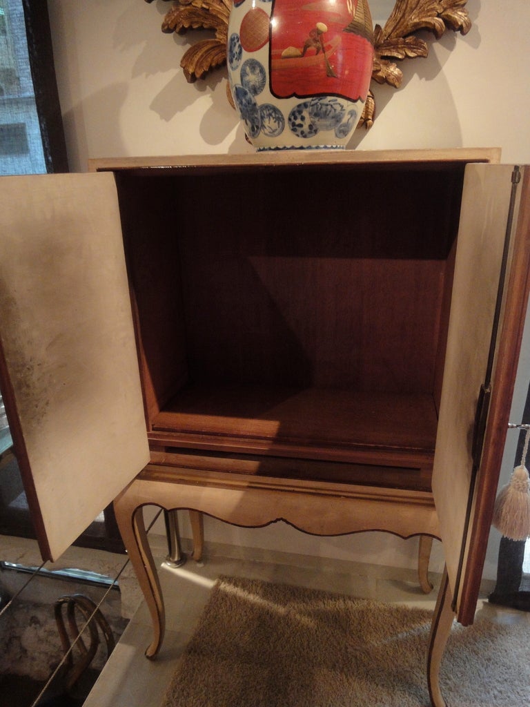 A cream-painted cabinet-on-stand 5