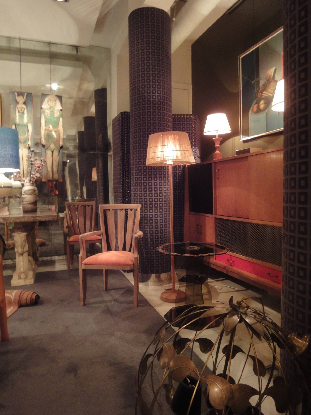 An oak-wood reading stand lamp with its shade made of linen yarns-work.