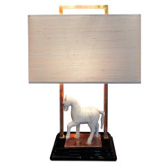 A Table-lamp With A Bone Horse