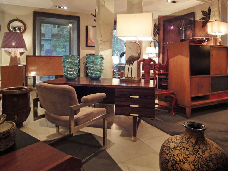 A large rosewood writing desk by Kai Kristiansen.