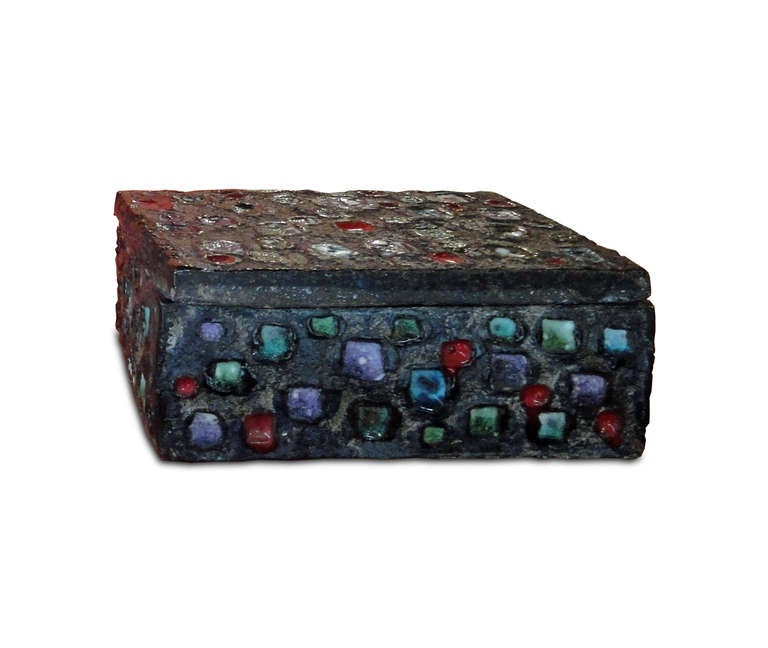 A rectangular enameled terra cotta box signed J.Foville.