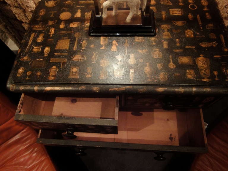 A Victorian Commode Decorated with 