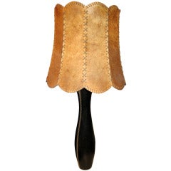 A Table Lamp Covered In Leather